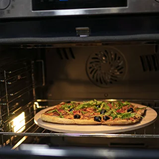 Rund pizzasten, lavet af cordierit, diameter 33 cm – photo 11